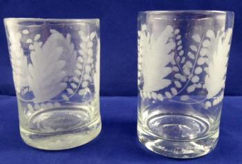 Two glasses with cut leaves Two glasses with cut leaves