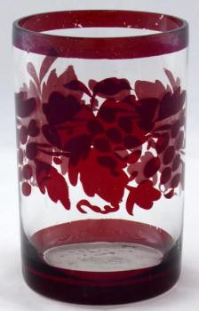 Glass with ruby stainning and grape leaves with gr